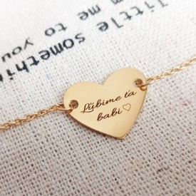 Zlatý ocelový náramek pro ženu